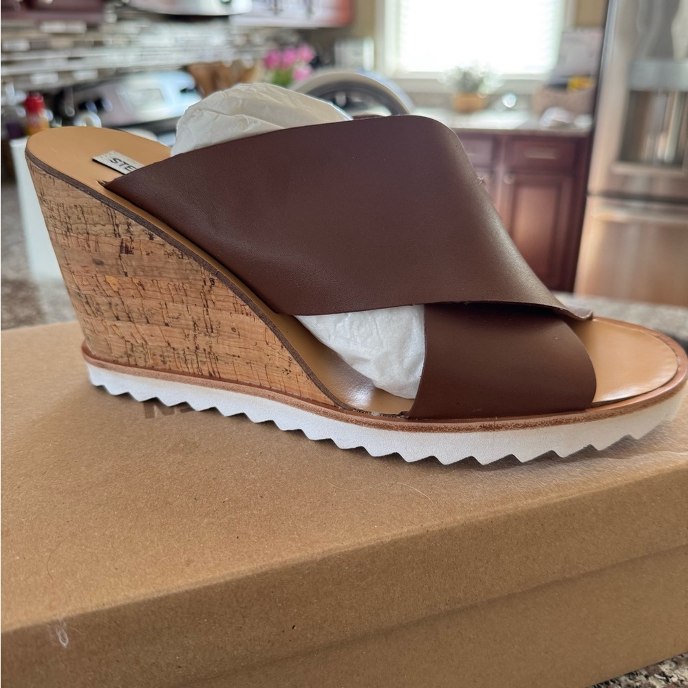 Brand new Steve Madden wedge in Cognac. Size 10. Never worn.